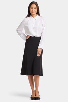 Upgrade your workwear wardrobe with NYDJ's Midi Skirt. Expertly designed with a fluid hem, this flattering crepe skirt moves with you. Style it with our Modern Blazer for a sleek office look that pairs equally well with heels or sandals. | NYDJ Women's Midi Skirt in Black, Regular, Size: 2 Modern Blazer, Sleek Office, Workwear Wardrobe, Jeans Petite, Crepe Skirt, Crepe Skirts, Office Look, Black Midi Skirt, Jean Top