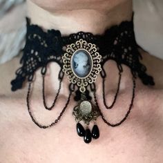 Embrace the style of Victorian aristocracy with this Steampunk choker. Indulge in the elegant allure of our Steampunk Duchess Choker, transporting you into the realm of a true Steampunk lady. Handcrafted with utmost care, this exquisite necklace showcases the perfect blend of refinement and originality. The black lace, adorned with embroidered flowers, exudes a captivating femininity, while the cameo featuring a Victorian woman in profile adds a touch of vintage charm. Delicate chains bestow a s Woman In Profile, Steampunk Choker, Steampunk Lady, Victorian Women, Steampunk Fashion, Feminine Look, Handmade Necklace, Embroidered Flowers, Vintage Charms