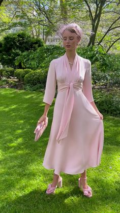 The Fontaine Dress is a beautiful 1940s-inspired softly tailored silk dress, featuring classic lines and elegant proportions. Made from our signature, fluid Italian silk crepe. With its narrow, elongated v-neckline, this dress elegantly frames the face while remaining demure enough for every occasion. The gentle A-line skirt is lined in tonal silk satin, skimming the hips, falling in soft, fluid folds, and designed to fall to a graceful midi length. Fontaine's silhouette has slim 3/4 length slee Silk V-neck Formal Dress, Silk V-neck Dress For Formal Occasions, Formal Silk Midi Dress With Surplice Neckline, Silk Midi Dress With Surplice Neckline For Formal Occasions, Pink V-neck Dress With Surplice Neckline For Formal Occasions, Elegant Solid V-neck Midi Dress, Feminine Evening V-neck Midi Dress, Elegant Silk Midi Dress With Surplice Neckline, Elegant V-neck Dress With Fitted Bodice