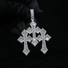 Details: Material: White Gold plating over .925 Sterling Silver base with Moissanite Stone: VVS Moissanite Pendant height: Tripe cross 2.08"(H) Bail size: Fit through chain maxi. 10mm(W) Pendant weight: Single cross: 15.7g, Triple cross: 41.6g Moissanite Pendant, Holiday Sales, Gold Plating, Cross Pendant, Baguette, Plating, 925 Sterling Silver, White Gold, Sterling Silver