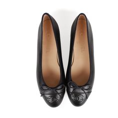 This pair of CC Ballet flats are in dark navy blue lambskin, with an embossed "CC" logo toe cap, tie front, tonal stitching, and black leather soles. Origin: ItalyCondition: New and never wornAccompanied by: Damaged Chanel box, Two shoe dustbagsSize: 37 EU Shoe Png Aesthetic, Black Chanel Ballet Flats, Ballet Flats Chanel, Channel Flats, Chanel Ballet Flats Black, Black Wishlist, Black Chanel Flats, Chanel Black Flats, Asymmetrical Face