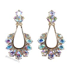 These Are Brand New Women's Iridescent Rhinestone Drop Earrings. These Beautiful Earrings Feature Sparkling Pear And Navette Cut Iridescent Rhinestones, Gold Toned Hardware, And Drop Style. All Orders Are Packaged With And Are Shipped Out Asap! Questions? Leave Us A Comment! We Are More Than Happy To Help! New To Poshmark? Use The Invite Code Dailyshopper73 When You Create Your Account For $10 Off Your First Purchase! Iridescent Jeweled Jewelry For Parties, Elegant Iridescent Sparkling Earrings, Iridescent Sparkling Earrings, Elegant Iridescent Crystal Earrings For Pierced Ears, Elegant Iridescent Sparkling Crystal Earrings, Iridescent Crystal Earrings For Party, Sparkling Iridescent Drop Earrings, Iridescent Crystal Drop Earrings, Magpie