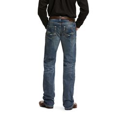 Ruggedly handsome for wherever the day (or night) takes you. These jeans are low-waisted and cut slimmer through the seat and thigh with a fashion boot-cut leg opening. Slim through seat and thigh Low rise Stackable straight leg 13.5 oz ring-spun stretch denim Medium wash with fashion back pocket No-rub comfort inseams Anchored belt loops Heavy-duty zippers and hardware Extra deep front pockets 99% cotton, 1% spandex Machine wash cold | Men's M5 Slim Stretch Adkins Stackable Straight Leg Jeans i Rugged Fitted Straight Leg Jeans, Rugged Fitted Jeans With Five Pockets, Fitted Rugged Jeans In Medium Wash, Rugged Fitted Denim Blue Bottoms, Fitted Rugged Denim Blue Bottoms, Rugged Fitted Straight Leg Bottoms, Straight Leg Jeans Men, Low Waisted, Work Boots