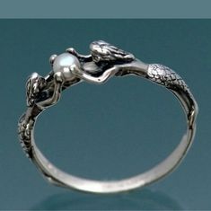 Sterling Silver .925 Stamped. Believed To Be Sterling Plated Rather Than Solid Sterling. Mermaids With Ball (Pearl) Ring. Pearl Is Faux. Full Disclosure ! Love This Ring! It's So Cute! U Can Put Clear Nail Polish On It So It Lasts Longer And If U Are Sensitive To Metals This Also Helps Stop Irritation. Buy2 Get 3rd Free!! 5 Or More Gets 30% Order. Silver Pirate Ring, Pirate Ring Women, Mermaid Ring, A Mermaid, Engagement Jewelry, Pearl Size, Pretty Jewellery, Pearl Ring, Lead Time