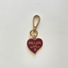 Prada Heart Charm For Purse Or Keys. Great Conditionjust Shows A Bit Of Wear On The Part Of The Clasp That Sits On The Bag/Key Ring. Was On A Previous Purse For Years. Does Not Come With Pursephoto Just For An Example As To How To Style It. Reselling This For My Grandmother In Law, So It Doesn’t Come With Original Packaging (Honestly, This Was Probably Purchased A Decade Or Two Agobut It Remains In Excellent Condition). Heart Key Chain, Prada Red, Holiday Wishlist, Chain Purse, Gold Girl, Heart Key, Bag Charms, Heart And Key, Heart Keychain