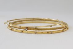 SET - 3 Solid Gold Diamond Bangle Bracelets in 18K Solid Gold – Studio1040 Solid Gold Bangle, Hammered Bangles, Trending Bracelets, Diamond Necklace Designs, Solitaire Rings, Contemporary Earrings, Bangle Bracelet Set, Solitaire Pendant Necklace, Diamond Bangles Bracelet