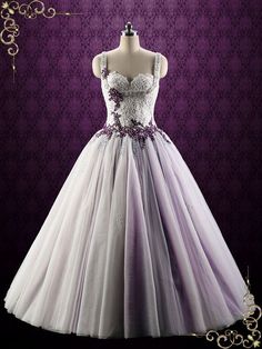 a white and purple dress on a mannequin