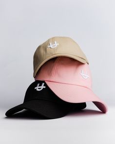 Get your head in the game with UPPPER’s Pink Original U Cap. This sleek cap features a 3-D U-logo embroidery, allowing you to showcase your favorite fitness gear brand wherever you go. Designed for comfort, it includes an adjustable strap with a custom slider featuring the UPPPER logo, ensuring a perfect fit for every head. The cap is crafted with a soft, unstructured crown, providing a relaxed fit and a trendy look, and is made of 100% cotton for breathability and durability. It's the perfect a Functional Adjustable Snapback Hat, Adjustable Sporty Snapback Hat With Curved Bill, Adjustable Curved Bill Snapback Hat For Sports, Sporty Adjustable Snapback Hat With Curved Visor, Functional Baseball Cap For Sports Events With Curved Bill, Functional Curved Bill Baseball Cap For Sports, Functional Curved Bill Baseball Cap For Sports Events, Sports Snapback Hat With Curved Bill, Pink Sports Hats With Embroidered Logo