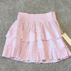 Light Pink. Brand New Cute Ruffled Mini Skirt For Spring, Cute Tiered Skirt For Summer, Cute Tiered Summer Skirt, Casual Ruffle Skirt For Spring, Casual Ruffled Skirt For Spring, Spring Day Out Tiered Mini Skirt, Spring Tiered Mini Skirt For Day Out, Cotton Tiered Mini Skirt For Spring, Tiered Cotton Mini Skirt For Spring