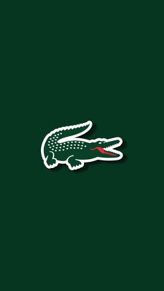 an alligator sticker on a green background