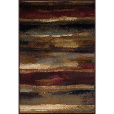 an area rug with multicolored stripes on the bottom, and dark brown background