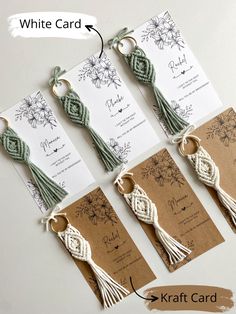 four different types of wedding cards with tassels attached to the tags and ribbons