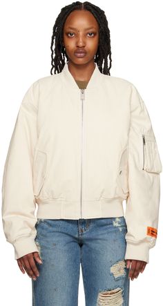 Padded cotton canvas bomber jacket. · Rib knit stand collar · Zip closure · Flap pockets · Rib knit hem and cuffs · Utility pocket at sleeve · Embroidered graphic logo patch at elbows · Embroidered graphic logo patch at back Supplier color: White 8 Ball, Heron Preston, Faded Denim, Black Denim Jacket, Graphic Logo, White White, Preston, Stand Collar, Outerwear Jackets