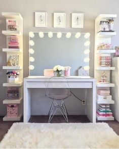 a white desk topped with a mirror and lights