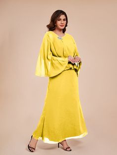 Upgrade your mother of the bride look with our Classy Column Ankle Length Chiffon dress. The elegant chiffon material flows beautifully, while the crystal embellishments add a touch of glamour. Perfect for any wedding or special occasion, this dress will make you feel confident and sophisticated.    Attention!     The cape is a layer of chiffon (Refer to the picture below) Mother Of The Bride Looks, Chiffon Material, Crystal Embellishment, Chiffon Fabric, Ankle Length, Mother Of The Bride Dresses, Chiffon Dress, Bride Dress, Mother Of The Bride