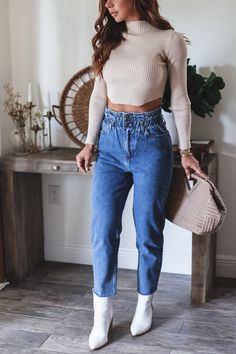 We love us some paperbag denim! This is style is less oversized + more fitted - but the same relaxed, comfy fit. So chic + versatile. Thick elastic waist is high waisted so can wear with your fave crop tops or bodysuits! Model is wearing a size Small. She is 5'6". 130lbs. Bust: 34" Waist 26" Hips 36" Paperbag Jeans Outfit, Paperbag Jeans, Love Us, Comfy Fits, Jean Outfits, Elastic Waist, High Waisted, Crop Tops, Boutique