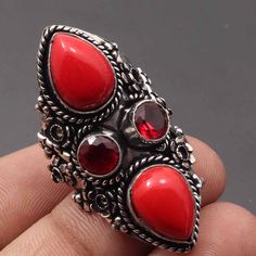 Red Coral Garnet Quartz Ring Jewelry Antique Style Ring Gemstone Ring Jewellery Sterling Silver Plated Ring Jewellery Gift For Her Materials  Sterling Silver Plated Ring US Size   8.5 Stone Name -Red Coral Garnet Quartz Stone Color  - Red Shipping Policy We do ship through DHL, UPS, INDIA POST.  I make more than 50 different gemstones. If you want other gemstones, Please inbox me. I'll show you the pictures before you buy. We will move forward only when you are satisfied. I can also make the ring in: Silver plated All kinds of customizations can be done. Try to keep it away from water. If it comes in contact of water then clean with a dry cotton cloth ASAP for the polish to stay longer. All shipping is tracked. Shipping through DHL Express shipping available in USA, UK and Australia I love Valentine's Day Crystal Gemstone Ring, Red Rings With Stones As A Gift, Red Rings With Stones For Gift, Vintage Red Stone Jewelry, Vintage Red Jewelry With Stones, Red Crystal Ring With Stone Setting For Promise, Red Crystal Promise Ring With Stone Setting, Vintage Red Crystal Gemstone Ring, Unique Red Stone Jewelry