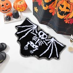 a halloween decoration with black and white decorations