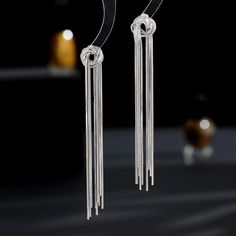 Color: Gold, Silver Fashion Element: Tassel Style: Niche Elegant Metal Tassel Earrings, Silver Dangle Tassel Earrings, Metal Long Drop Tassel Earrings, Long Drop Metal Tassel Earrings, Elegant Silver Tassel Earrings With Fringe, Silver Dangle Earrings With Tassels, Silver Long Drop Earrings With Tassels, Adjustable Silver Tassel Earrings For Party, Trendy Silver Dangle Tassel Earrings