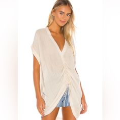 Viscose Blend. Front Drawstring With Ruched Detail. Metallic Threading Throughout. Ruched V-neck Top For Vacation, Ruched Short Sleeve Tops For Vacation, Short Sleeve Ruched Tops For Vacation, White Ruched Beach Top, White Ruched Tops For Beach, White Ruched Tops For The Beach, Summer Beach Top With Ruched Details, Ruched Beachwear Tops For Beach Season, Beachwear Ruched Tops For Beach Season