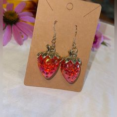 Iridescent Red Strawberry Dangle Earrings These Earrings Are So Cute And Sparkly. The Perfect Sweet Addition To Your Outfit. They Are Beautiful And Lightweight. Please See Photos For Dimensions. Brand New, Never Worn! #Coquette #Princess #Strawberry #Iridescent Trendy Red Metal Earrings, Red Nickel-free Crystal Earrings, Nickel-free Red Crystal Earrings, Trendy Red Drop Earrings, Nickel Free Red Crystal Earrings For Parties, Trendy Red Dangle Jewelry, Red Dangle Crystal Earrings For Gift, Red Dangle Crystal Earrings As A Gift, Trendy Red Pierced Earrings