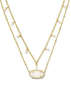 Elevate your style with the Kendra Scott Elisa Pearl Multi Strand Necklace. Featuring a multi-strand design and elegant white pearls, this necklace adds a touch of sophistication to any outfit. Perfect for date night or special occasions, it's a must-have addition to your jewelry collection! White Pearl Chain Layered Necklace As Gift, White Layered Pearl Chain Necklace As Gift, Elegant White Pearl Layered Necklace, White Double Strand Layered Jewelry, White Double Strand Necklaces For Layering, Elegant Double Strand Pearl Necklace For Layering, White Elegant Multi-strand Layered Necklace, Elegant White Multi-strand Layered Necklace, White Layered Double Strand Jewelry