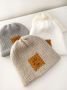 "WILD ONE Beanie! A great gift for a baby shower or for your own new baby... *This hat comes in a white, cream, parchment & Grey *Double layered for warmth *newborn size to 1-3 yrs *made of an acrylic yarn  *pompom is on a snap to make washing easier *handwash * * the current turnaround time is 1-3 days*  Newborn hat: measures 12\" diameter X 6\" tall 3-6 months: measures 12\" diameter X 7\" tall 6-12 months: measures 12\" diameter X 8\" tall 1-3 yrs: measures 13\" diameter x 9\" tall Sizing: 0-3 Months (12\"-14\" around) 3-6 Months (14\"-16\" around) 6-12 Months (16\"-18\" around) These hats are very stretchy and will fit as baby grows! These would be adorable for newborn photos, for your family photoshoot, or just for daily wear! Hand wash Lay flat to dry Acrylic yarn Will refund any shi Cute White Crochet Hat For Gift, Cute White Crochet Hat For Gifts, Cute White Crochet Hat As Gift, White Crochet Hat For Winter Gift, Cute Cream Hat For Gift, Winter White Crochet Hat As Gift, White Beanie Bonnet As A Gift, Cream Beanie Hat As Gift, Cream Winter Hat As Gift