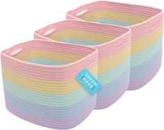 two pastel colored baskets with labels on them