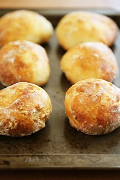 freshly baked pastries on a baking tray ready to be eaten