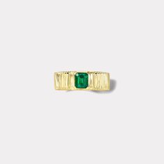 Gold Emerald Ring Channel Set, Luxury Yellow Gold Emerald Baguette Cut Ring, Gold Emerald Jewelry With Channel Set, Luxury Yellow Gold Emerald Ring With Baguette Cut, Elegant Yellow Gold Emerald Ring With Channel Set, Gold Emerald Ring With Channel Set For Gift, Gold Baguette Cut Emerald Ring, Yellow Gold Emerald-cut Diamond Ring With Channel Set, Yellow Gold Emerald Cut Emerald Ring With Channel Set