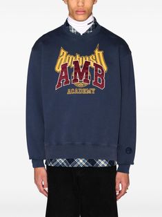 Find AMBUSH Logo-appliqué Sweatshirt on Editorialist. navy blue/yellow/bordeaux red cotton jersey texture logo print to the front appliqué logo embroidered logo at the sleeve crew neck long sleeves ribbed cuffs and hem Fall Varsity T-shirt With Logo Print, Navy Top With Embroidered Logo For College, Long Sleeve T-shirt With Logo For Streetwear, Collegiate Logo Tops For Streetwear, Collegiate Tops With Logo For Streetwear, Collegiate Tops With Logo Detail For Streetwear, Navy Cotton Sweatshirt With Logo Print, College T-shirt With Embroidered Logo For Fall, Fall College T-shirt With Embroidered Logo