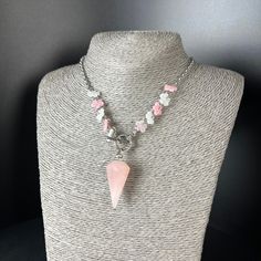 Wear something unique with this sakura pendulum necklace, a wonderful piece of jewelry and divination tool Rose Quartz Properties, Pendulum Necklace, Cherry Blossom Tattoo, Cherry Blossom Flowers, Rose Quartz Gemstone, Rose Quartz Crystal, Quartz Rose, Heart Chakra, Gothic Fashion