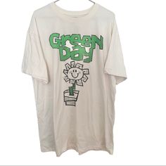 Green Day Kerplunk Flower Pot Cream T-Shirt Size S/M 60 % Cotton 40% Polyester New With Tags Color Cream Fits A Little Oversized Can Fit Large Too All Genders Kerplunk Green Day, Green Day Concert Outfit, Green Day T Shirt, Justin Bieber Shirts, Green Day Shirt, Cream T Shirt, Tech Shirt, Concert Outfits