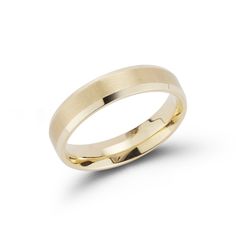 a wedding ring in yellow gold with an irregular design on the outside and inside side