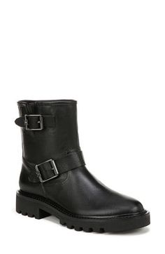 Decorative buckle straps and a treaded lug sole give a moto-inspired kick to this leather bootie. 1 1/4" heel 6" shaft Pull-on style Leather upper/synthetic lining and sole Imported Winter Moto Boots For Workwear, Fall Calf Leather Moto Boots With Buckle, Ankle-high Moto Boots With Lug Sole For Work, Fall Moto Ankle Boots With Buckle Closure, Fall Moto Ankle Boots With Buckle, Fall Calf Leather Moto Boots With Reinforced Heel, Fall Ankle Moto Boots With Buckle, Workwear Ankle Moto Boots With Lug Sole, Ankle-high Moto Boots With Buckle For Work