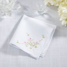 Indulge in the exquisite charm of the Delicate Floral Embroidery Handkerchiefs. Each handkerchief is a testament to artistry, featuring intricate floral designs meticulously embroidered with care. Whether tucked into a suit pocket or delicately held, these handkerchiefs elevate any occasion with their timeless elegance. Perfect as thoughtful gifts or personal indulgences, they capture the essence of refined style and classic beauty. Embrace sophistication with every gentle fold and flutter of th Flower-shaped Embroidered Handkerchiefs For Gifts, Traditional Floral Embroidered Handkerchiefs As Gift, Flower Shaped Embroidered Handkerchiefs For Gift, Embroidered Flower Handkerchiefs As Gift, Embroidered Flower Handkerchiefs For Gifts, Elegant White Floral Embroidered Handkerchiefs, Elegant White Handkerchiefs With Floral Embroidery, White Embroidered Flower-shaped Handkerchiefs, White Embroidered Flower Shaped Handkerchiefs