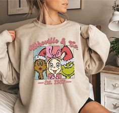 Christmas Whoville University Est 1957 Sweatshirt, Grinch Sweat, Christmas Family Gift, Christmas Shirt, Grin Sweatshirt, Xmas Family Shirts Welcome to AuroraConceptDesign! ❤️ 👉🏻 PROCESSING TIME: - 3-5 business days. - Please contact us if there is a rush order. 👉🏻 DELIVERY TIME: - Standard Shipping:  3-5 business days - Expedited Shipping  1-3 business days 👉🏻 CARE INSTRUCTIONS: - Machine wash cold and tumble dry low.  - Do not iron directly onto the design. - Do not bleach. We offer a wi Christmas Schedule, Christmas Whoville, Whoville University, Fall Crewneck Sweatshirt, Grinch Shirts, Christmas Guide, Handmade Leather Wallet, Personalized Wallet, Family Christmas Gifts