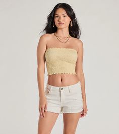 Radiate sunny vibes in the cutest cropped tube top! Designed with an adorable ditsy floral print on stretchy smocked knit fabric, it features a strapless straight-across neckline, a cropped hem, a dainty ruffled trim, and a form-hugging fit. Style with denim shorts and sneakers.Fit & FeaturesDitsy floral printStretchy smocked ribbed knit fabricStrapless straight necklineCropped hemRuffled trimsForm-hugging fitRuns true to size Casual Smocked Back Tube Top For Beach, Casual Beach Tube Top With Smocked Back, Casual Strapless Tube Top With Smocked Back, Casual Smocked Bodice Tube Top For Summer, Spring Stretch Tube Top With Smocked Bodice, Spring Smocked Bodice Bandeau Crop Top, Trendy Smocked Bandeau Tube Top, Summer Strapless Smocked Stretch Top, Trendy Bandeau Tube Top With Smocked Bodice