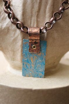 "Copper and Blue tone pendant necklace. Nature inspired engraved leaves on copper and blue tone metal necklace.   Copper tone rolo chain.  Lobster Clasp. 3\" extender. As always, made with love, made for you." Blue Copper Pendant Necklace, Unique Blue Necklace With Patina, Blue Copper Artisan Necklace, Artisan Blue Copper Necklace, Blue Stamped Necklace As Gift, Blue Metal Jewelry With Patina, Unique Blue Etched Jewelry, Unique Etched Blue Jewelry, Copper And Blue