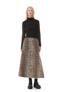 AVAILABLE EXCLUSIVELY IN GANNI STORES AND ON GANNI.COM. This Leopard Printed Elasticated Maxi Skirt is made from organic cotton. The skirt is designed for a regular fit and features an elasticated waist, side pockets, leopard print and subtle GANNI logos. GANNI Leopard Printed Elasticated Maxi Skirt in Leopard | Women's Size 4 | Cotton/Organic Cotton Ganni Leopard, Leopard Skirt, Denim Maxi, Crochet Mini Dress, The Leopard, Party Skirt, Full Circle Skirts, Denim Mini Dress, Maxi Skirts