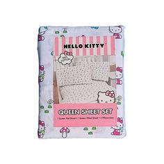 the hello kitty bedding set is in pink and white