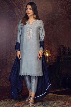 Fanaa | Ready To Wear | Luxury Formal Women Suits – Zaaviay Global Blue Contrast Colors Dress, Navy Blue Contrast Color Dress, Silver Party Wear Dresses With Mirror Work, Silver Dresses With Mirror Work For Festive Occasion, Silver Dress With Mirror Work For Festive Occasions, Blue Embellished Raw Silk Sets, Elegant Hand Embellished Long Sleeve Kurta, Embellished Blue Raw Silk Set, Silver Dress With Mirror Work For Designer Wear