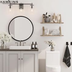 a bathroom with a sink, toilet and shelves on the wall next to each other