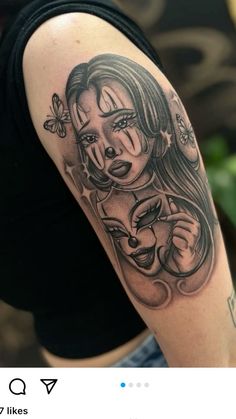 a woman with a tattoo on her arm