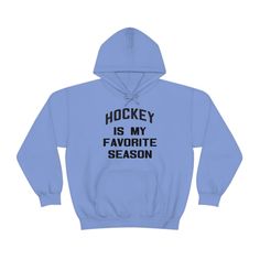 Hockey Is My Favorite Season - Women's Hooded Sweatshirt This unisex heavy blend hooded sweatshirt is relaxation itself. Made with a thick blend of cotton and polyester, it feels plush, soft and warm, a perfect choice for any cold day. In the front, the spacious kangaroo pocket adds daily practicality while the hood's drawstring is the same color as the base sweater for extra style points. .: 50% cotton, 50% polyester (fiber content may vary for different colors) .: Medium-heavy fabric (8.0 oz/y Winter Hoodie For Fans, Hockey Mom Sweatshirt, Hockey Mom Sweatshirt Hoodie, Hockey Sweatshirts Hoodie, Tee Shirt Hockey, Hockey Apparel, Hockey Hoodie, Hockey Sweatshirts, Hockey Quotes