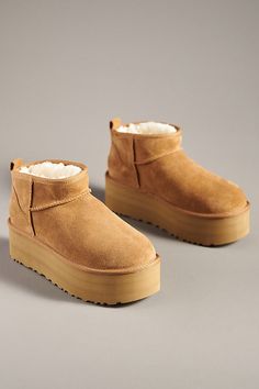 * Sheepskin upper, insole* Rubber sole* Pull-on styling* Imported Pink Ugg Boots, Waterproof Uggs, Ugg Ultra Mini, Ugg Classic Ultra Mini, Ugg Bailey Button, Honey Color, Ugg Classic Mini, Brown Fits, Outfit Inspiration Fall