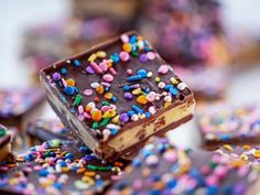 chocolate and sprinkles are stacked on top of each other