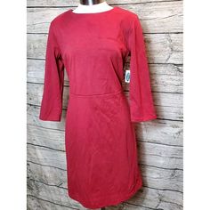 This Old Navy Sheath Dress In Solid Red Is Perfect For Any Occasion, Whether It's For Travel, Workwear, Or Business. The Knee-Length Dress Features 3/4 Sleeves And A Round Neckline With A Zip Closure. It's Made Of High-Quality Material And Is Available In Size Small. The Dress Is Stylish And Versatile, Suitable For Any Woman's Wardrobe. The Dress Is Perfect For Those Who Prefer A Simple And Elegant Style. It's A Must-Have For Any Woman Who Wants To Look Her Best. 2912 69 Navy Sheath Dress, Solid Red, Women's Wardrobe, Old Navy Dresses, Knee Length Dress, Elegant Style, Sheath Dress, Round Neckline, Old Navy