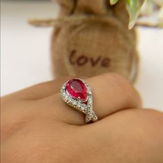 Rhodium Plated Hot Pink Quartz Silver Teardrop Ring With Diamond Accents, Silver Ruby Jewelry With Accent Stones, Party Ruby Ring In Silver, Silver Ruby Ring For Party, Silver Ruby Ring With Diamond Accents As Gift, Silver Ruby Ring With Halo Setting, Party Silver Ruby Ring, Silver Ruby Ring With Diamond Accents, Silver Ruby Ring With Diamond Accents For Promise