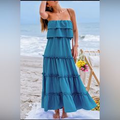 Cupshe Brand New Never Worn Size Medium Bust:35.5-37.5in Waist:27.2-29.2in Hip:38.2-40.2in Dance Into Summer With Our Ruffled Tiered Maxi Tube Dress! Featuring Cascading Tiers Of Playful Ruffles, This Dress Exudes Bohemian Charm And Carefree Elegance, Perfect For Twirling Through Sunny Days And Warm Nights With Style And Grace. Product Code: Caa05a4e054tt Features: Woven Straight Neckline Sleeveless & Strapless Tiered Flounce Bodice Micro-Ruffle Detail Maxi Material: 100%Polyester Blue Strapless Maxi Dress With Ruffles, Beach Season Party Maxi Dress With Ruffles, Fitted Ruffle Maxi Dress For Beach Season, Fitted Maxi Dress With Ruffles For Beach Season, Beach Dresses With Ruffled Tiered Skirt, Flowy Ruffled Dress For Beach, Beach Season Ruffled Midi Dress For Day Out, Fitted Ruffle Dress For Beach, Fitted Ruffle Dress With Ruffled Skirt For Beach